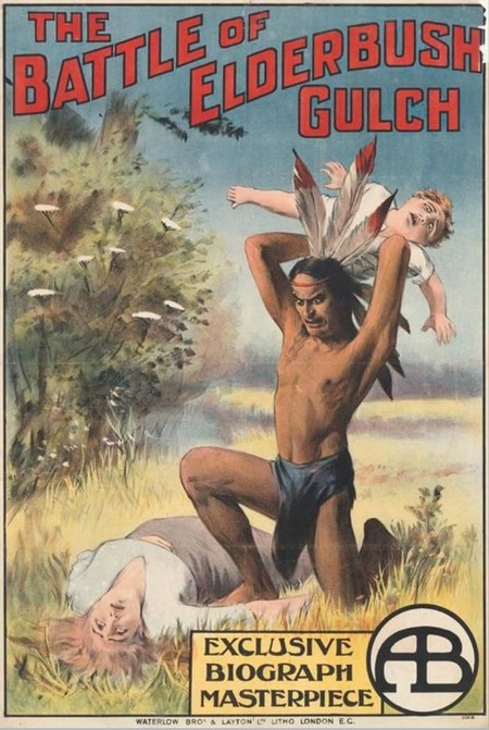 The poster for D.W. Griffith's short film from 1913 'The Battle of Elderbush Gulch'. It depicts a cliche version of the 'savage' Native American, dressed in a loincloth and feather headdress, wtih a baby raised over his head, implying violence with a women in anguished lying on the ground next to him.