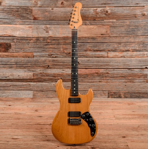 Nautral wood F-100 guitar with black hardware