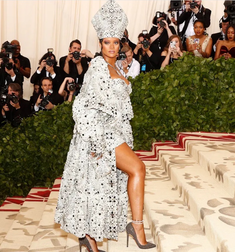 Singer Rihanna at the Met Gala, theme 'Heavenly Bodies' which used Catholic Church Imagery for Fashion Inspiration.