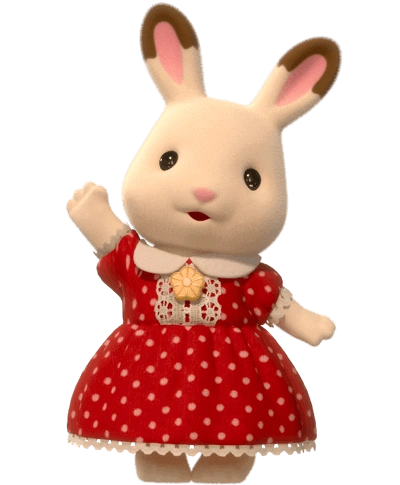 A white toy bunny with brown-tipped ears