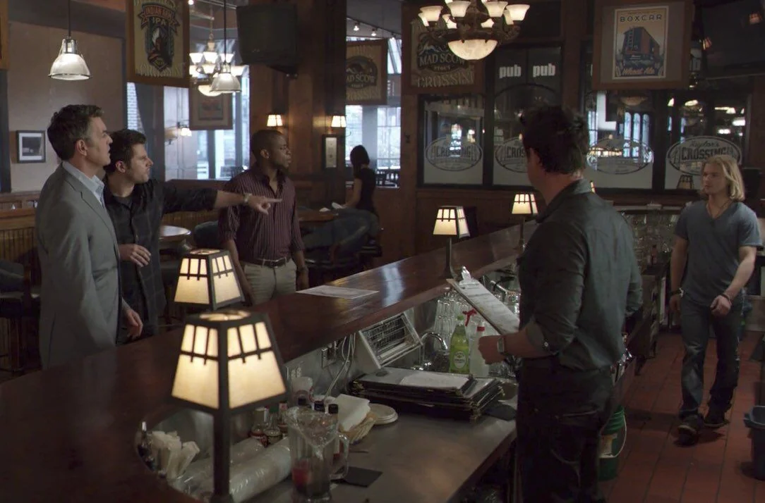 photo of the scene in the restaurant where shawn, gus, woody, and carlton were drugged