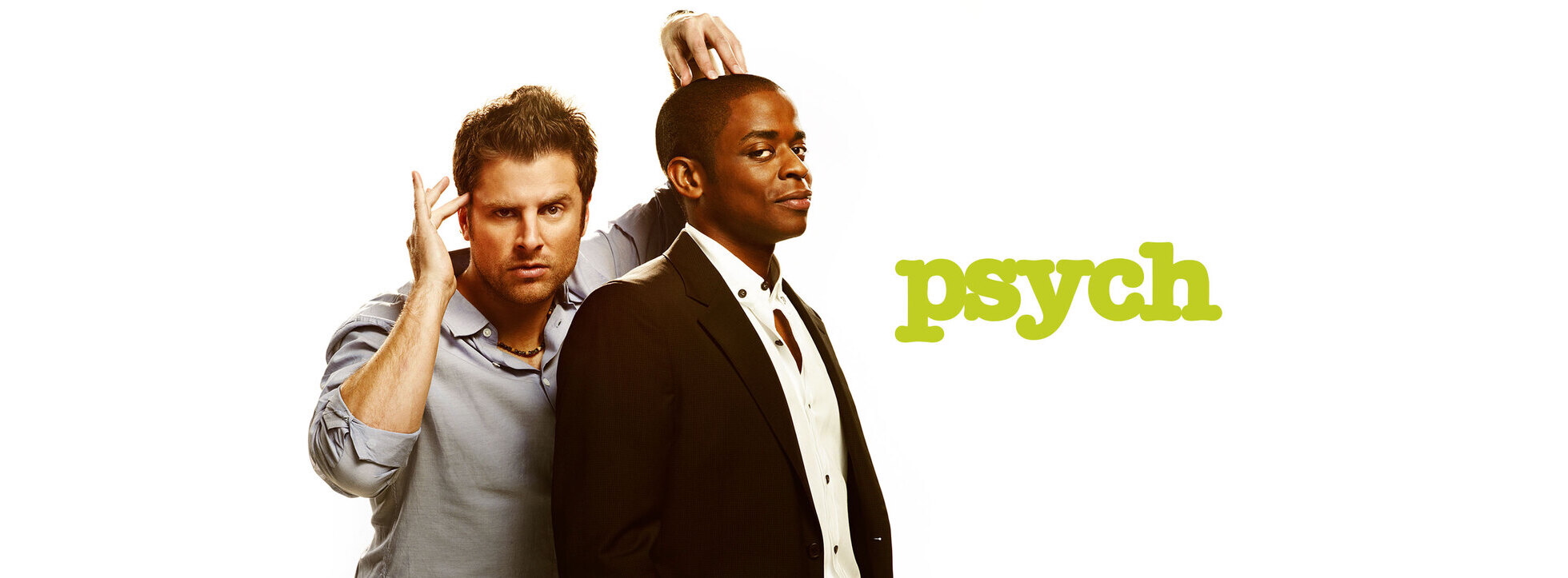 photo of shawn spencer and burton guster. Shawn has one hand on Gus head and his other finger to his temple as if receiving a psychic vision