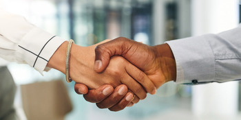 a closeup image of a handshake