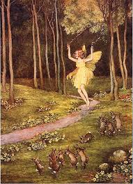 A fairy with yellow wings and a yellow dress walking down a forest path.