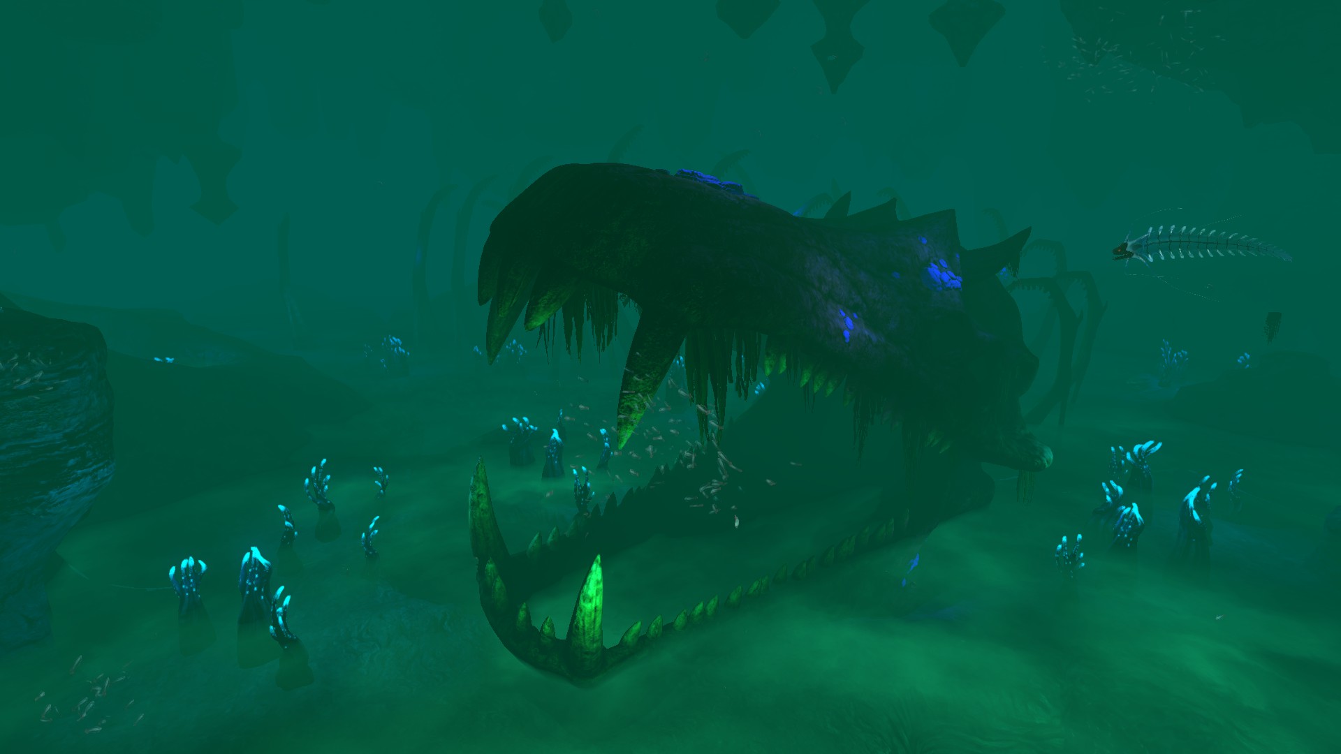 the water is murky and green. In the foreground, a giant gaping skull sits partially submerged in the murky river at the bottom of the image. Blue algae spots the bone, making it glow.