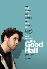Minimal film poster with a side-profile of a curly-haired man looking thoughtful against a teal background, with cast names at the top and the title “The Good Half” near the bottom.