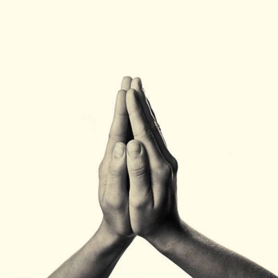 greyscale pair of hands praying