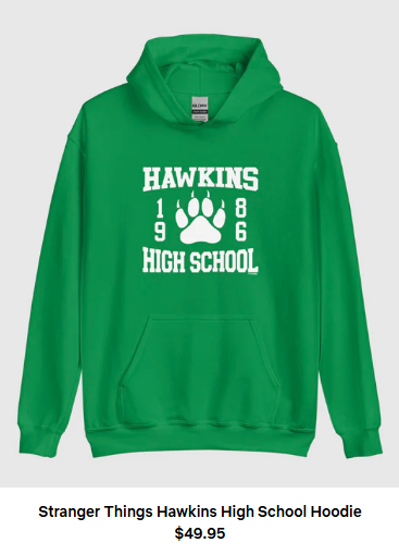 A green hoodie with the words Hawkins High School 1986 surrounding a pawprint shape. Words beneath it say Stranger Things Hawkins High School Hoodie $49.95