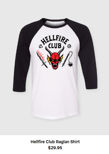 A white shirt with midlength black sleeves and a devil-like creature on the front under words that say Hellfire Club. Words beneath the image say Hellfire Club Raglan Shirt $29.95
