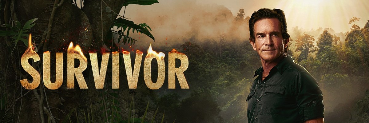 Jeff Probst standing in front of the title Survivor.