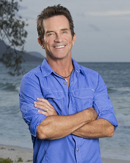 Jeff Probst with his arms folded.