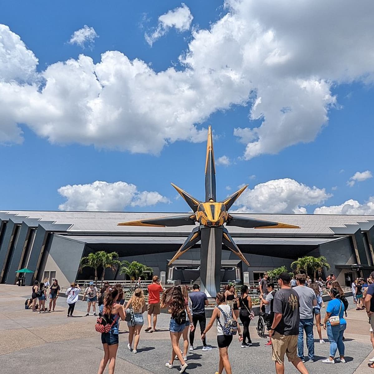 a crowd approaching the show building that houses Guardians of the Galaxy Cosmic Rewind.