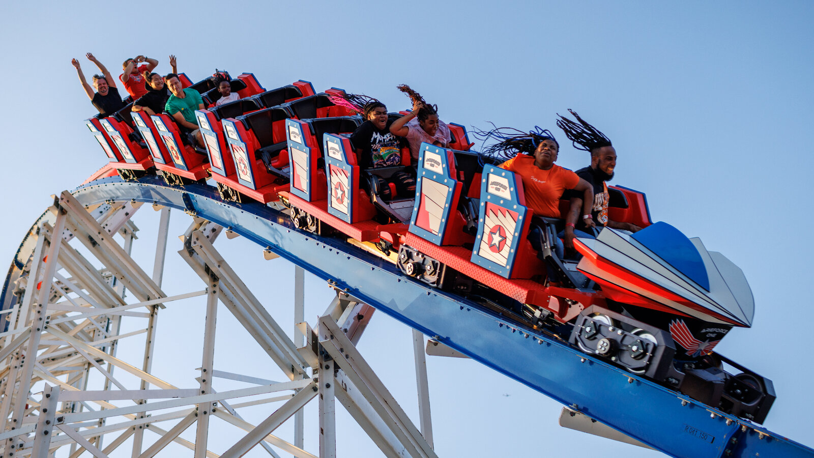 Riders going over a hill on ArieForce One at Fun Spot America Atlanta