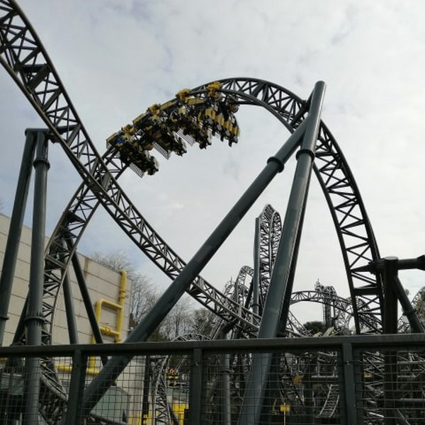 a train traveling through one of Smiler's many inversions