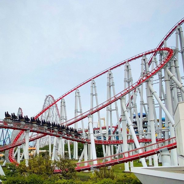 a train traveling near a helix on Steel Dragon 2000.