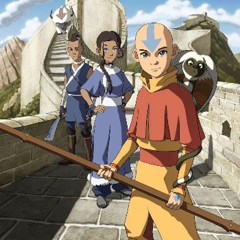 Aang, Katara, and Sokka standing on a battlement wall; the winged lemur Momo sits on Aang's shoulder while the skybison Appa stands in the back