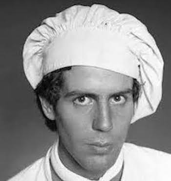 30 year old Bourdain posing in a toq and chef's whites.