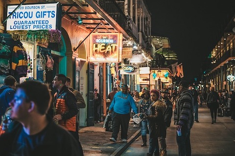 bustling city street outside the bar